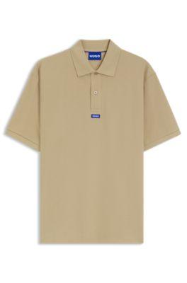 Cotton-piqu&eacute; polo shirt with blue logo badge by HUGO BOSS
