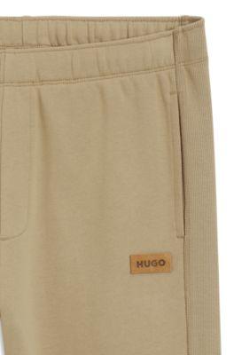 Cotton-terry sweatpants with logo badge by HUGO BOSS