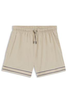 Drawstring swim shorts in stretch fabric with tape trim by HUGO BOSS
