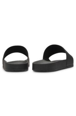 Italian-made slides with tonal logo by HUGO BOSS