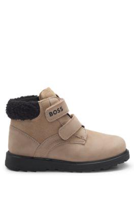 Kids' boots in leather with faux-shearling collar by HUGO BOSS