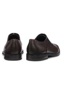 Leather Oxford shoes with perforated details by HUGO BOSS