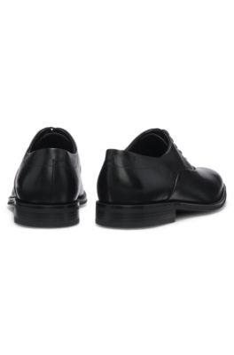 Leather Oxford shoes with perforated details by HUGO BOSS