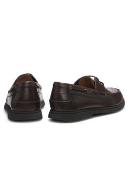 Leather boat shoes with embossed logo by HUGO BOSS