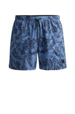 Logo-badge swim shorts with seasonal print by HUGO BOSS