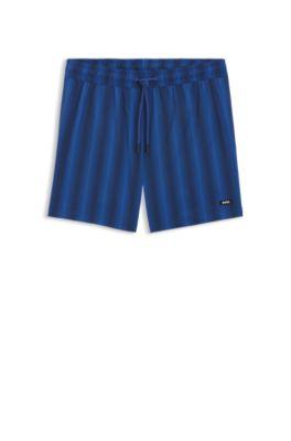 Logo-badge swim shorts with stripe by HUGO BOSS