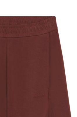 Logo-embroidery tracksuit bottoms with balloon fit by HUGO BOSS