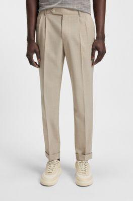 Micro-patterned tapered-fit trousers in virgin wool by HUGO BOSS Micro-patterned tapered-fit trousers in virgin wool by HUGO BOSS