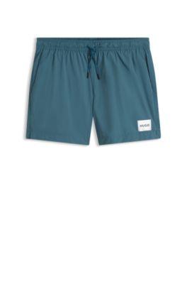 Quick-drying swim shorts in recycled material with logo by HUGO BOSS