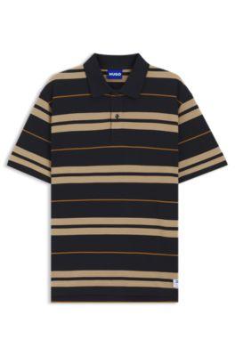 Regular-fit polo in cotton pique with engineered stripes by HUGO BOSS
