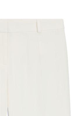 Regular-fit trousers with kick flare by HUGO BOSS