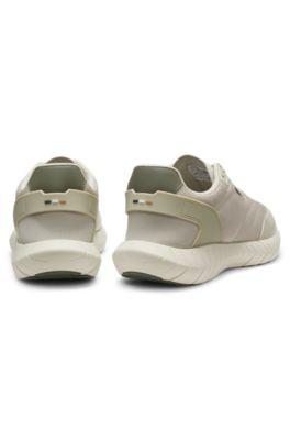 Running sneakers with leather trims by HUGO BOSS