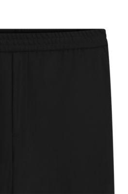 Tapered-fit trousers in a wool blend by HUGO BOSS