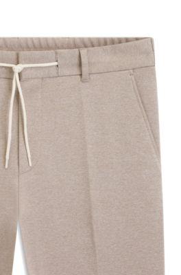 Tapered-fit trousers with reversible drawstring by HUGO BOSS
