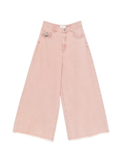 Marco flower-plaque frayed-hem jeans by HUI HUI