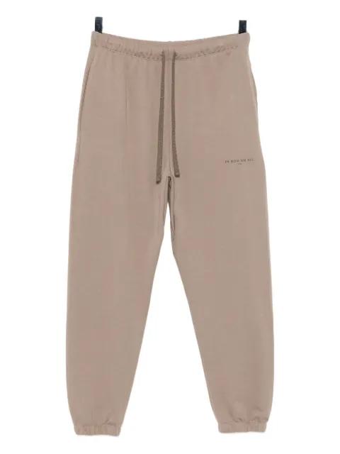 logo-print track trousers by IH NOM UH NIT