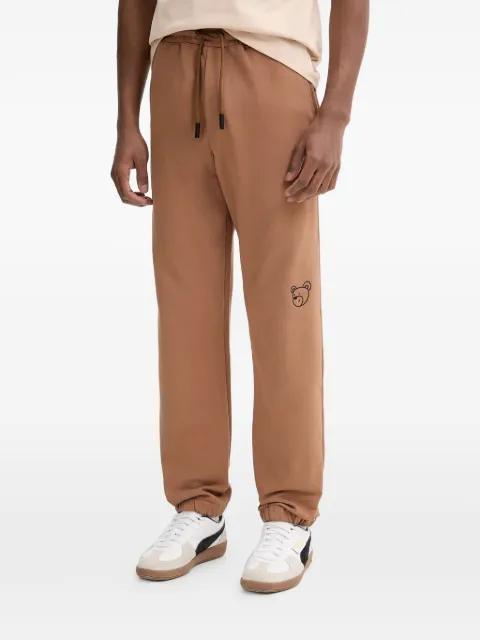 bear-motif drawstring trousers by INBETWEENERS
