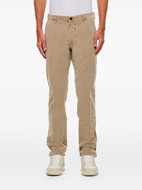 button-zip trousers by INCOTEX