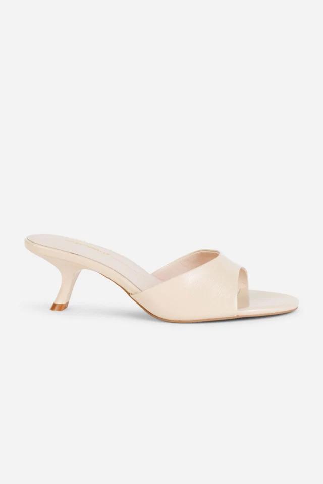 Intentionally Blank Given Mule Heel by INTENTIONALLY BLANK