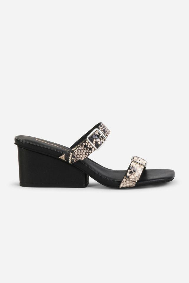Intentionally Blank Surrender Leather Wedge Heel by INTENTIONALLY BLANK