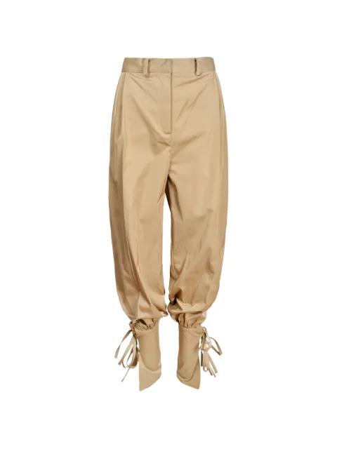 tie-fastening balloon trousers by IOANA CIOLACU