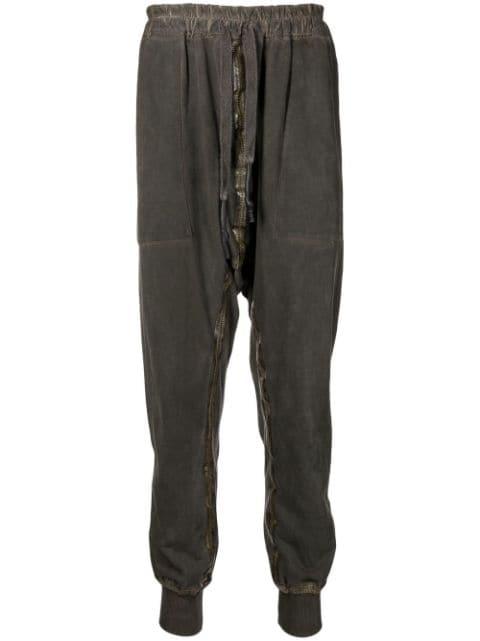 zip-embellished tapered trousers by ISAAC SELLAM EXPERIENCE
