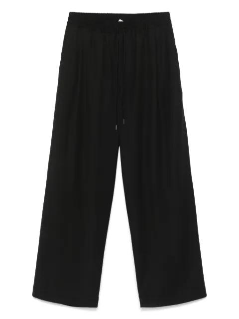 pleat-detailing trousers by ISABEL BENENATO