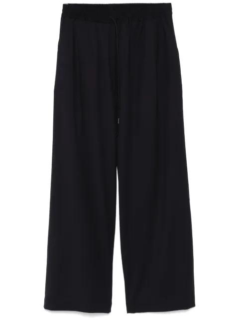 pleat-detailing trousers by ISABEL BENENATO