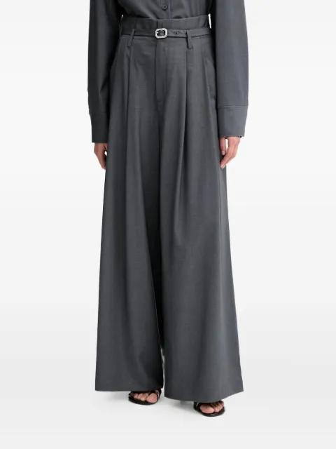belted pleated palazzo pants by ISABELLE BLANCHE