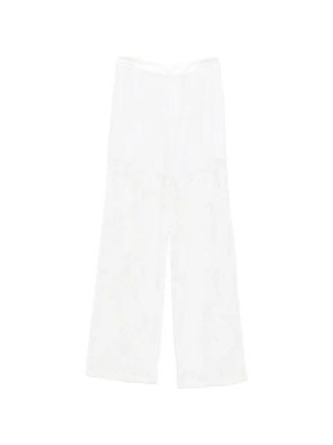 floral-motif trousers by ISABELLE BLANCHE