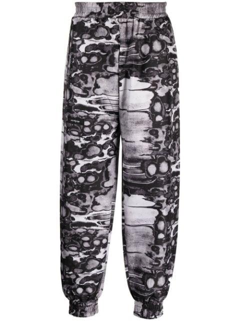 Khumbu abstract-print track pants by ISO.POETISM