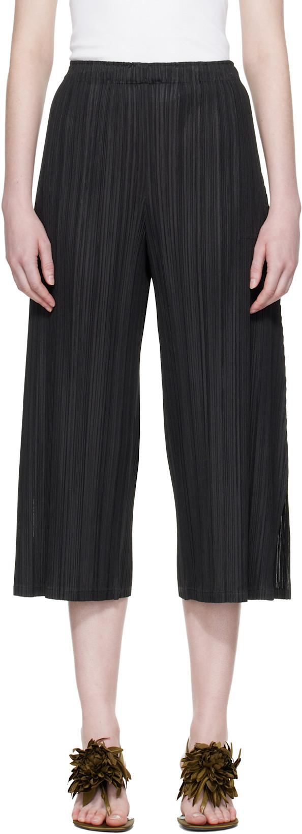 Black Mellow Pleats Trousers by ISSEY MIYAKE