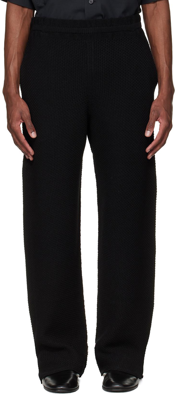 Black Rustic Knit Trousers by ISSEY MIYAKE