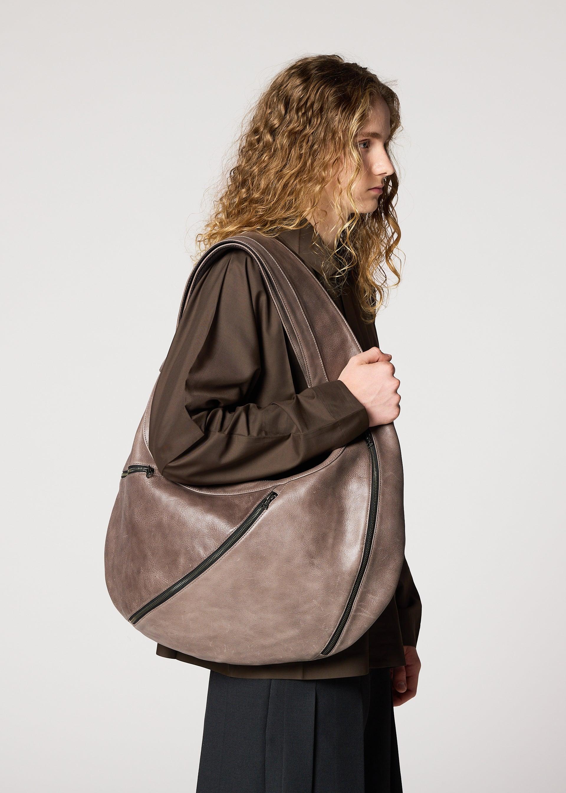 CARVED LEATHER BAG by ISSEY MIYAKE