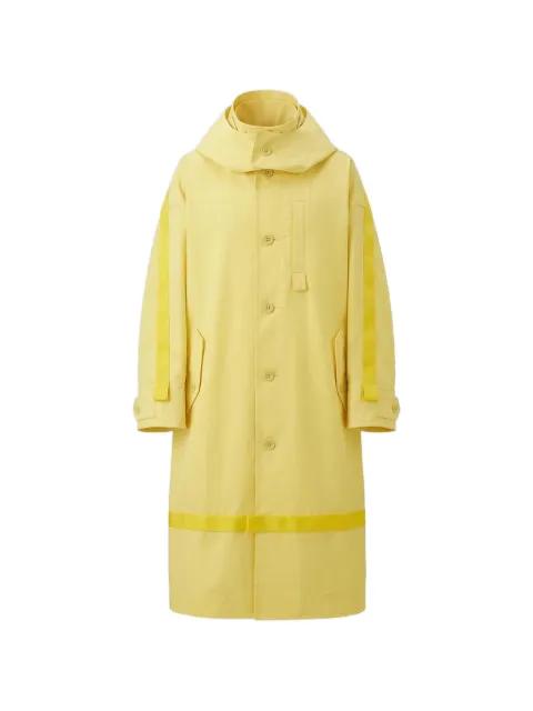Carrier Carried hoodied logo-print coat by ISSEY MIYAKE