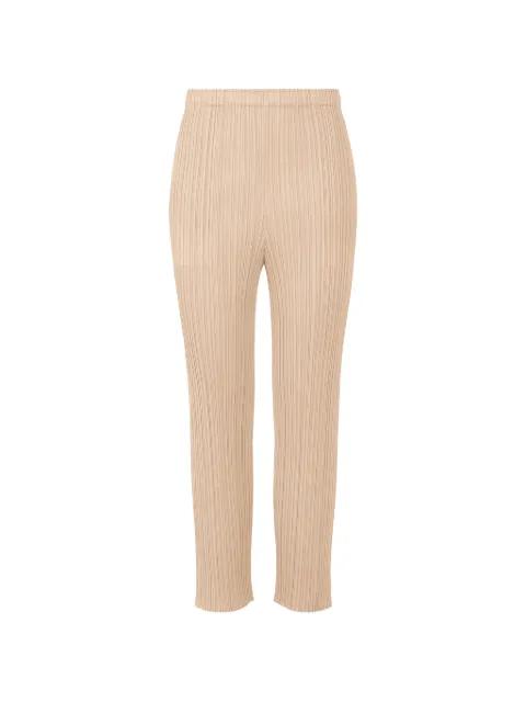 July pleated trousers by ISSEY MIYAKE