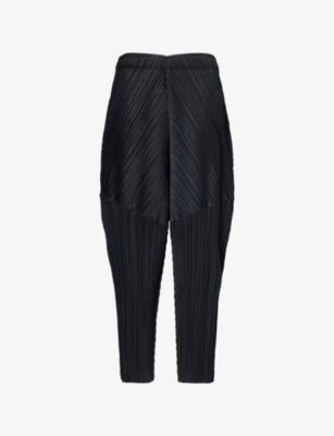 Thicker Bottoms Tapered Angular Plisse Knitted Trousers by ISSEY MIYAKE