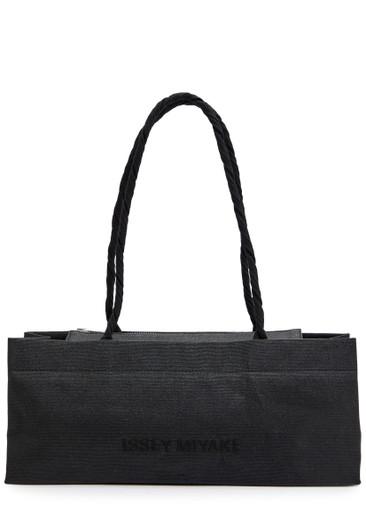 This Is A Paper Bag woven shoulder bag by ISSEY MIYAKE