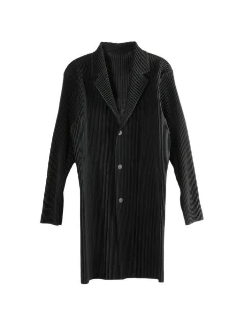 pleated buttoned coat by ISSEY MIYAKE