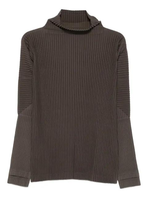 pleated roll neck top by ISSEY MIYAKE