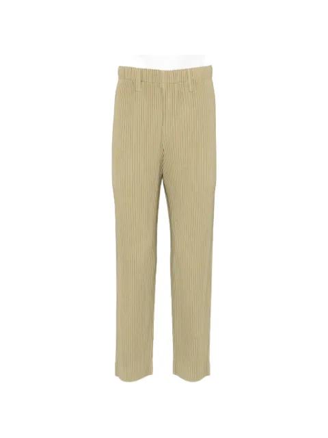 pleated tapered trousers by ISSEY MIYAKE