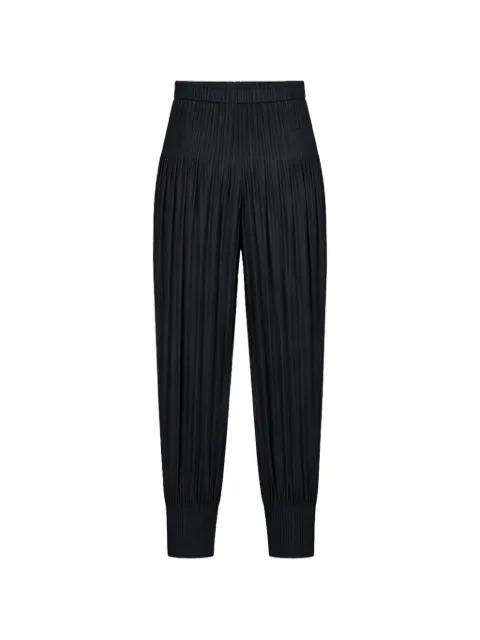 pleated tapered trousers by ISSEY MIYAKE