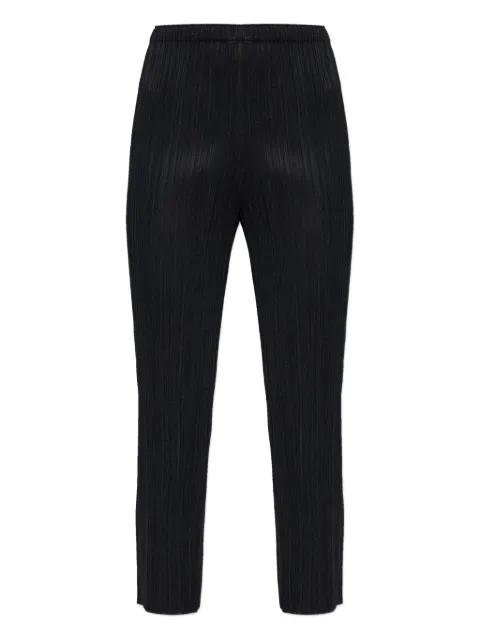 pleated trousers by ISSEY MIYAKE