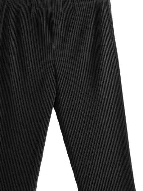 pleated trousers by ISSEY MIYAKE