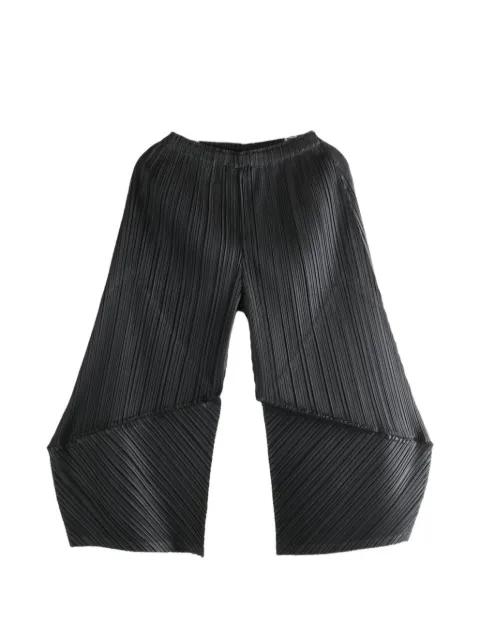 pleated trousers by ISSEY MIYAKE
