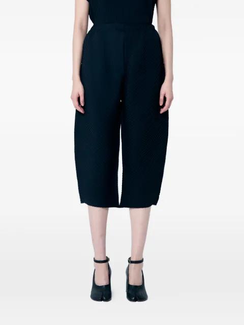 pleated trousers by ISSEY MIYAKE