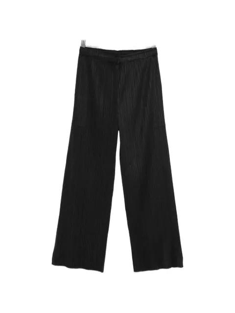 pleated trousers by ISSEY MIYAKE