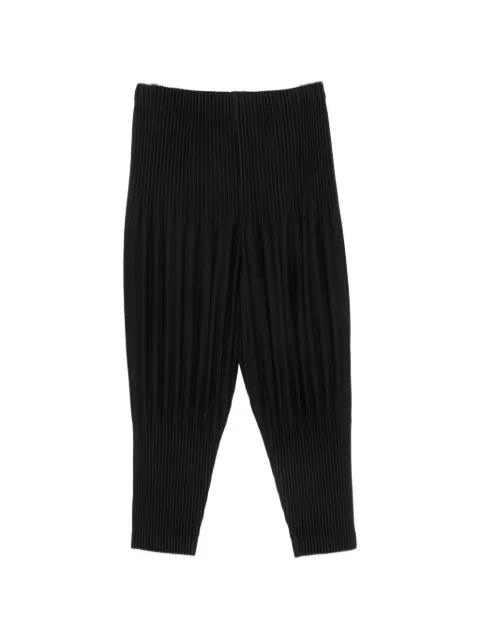 plissé-effect tapered trousers by ISSEY MIYAKE