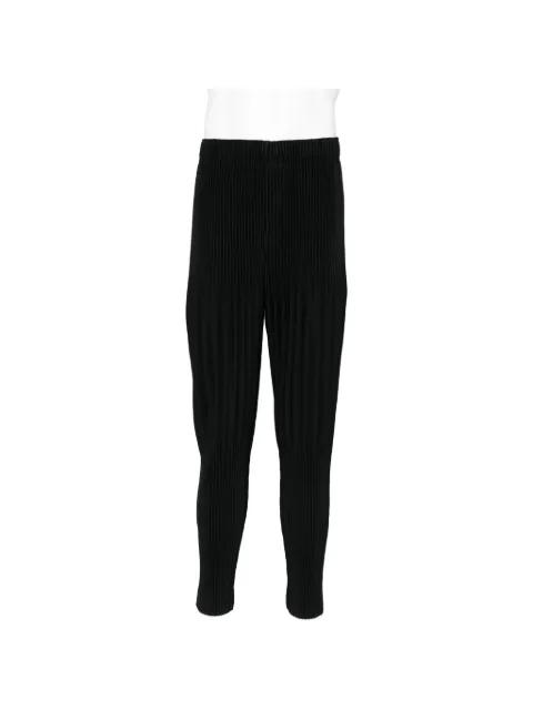 plissé tapered trousers by ISSEY MIYAKE