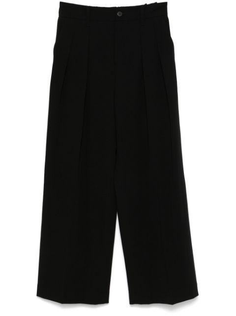 wool gabardine trousers by ISSEY MIYAKE
